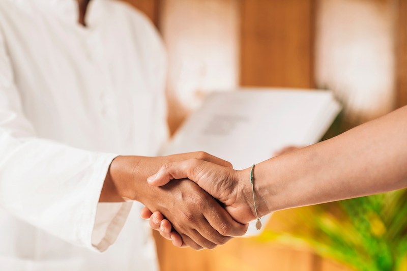 Doctor and Patient Handshake before acupuncture treatment for anxiety clinical practice oriental medicine medical history randomised controlled trial